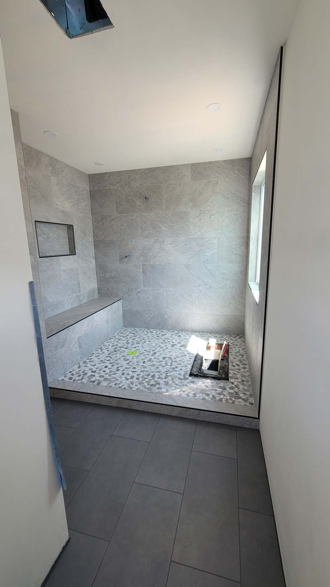 Tile Shower — Pebble Floor